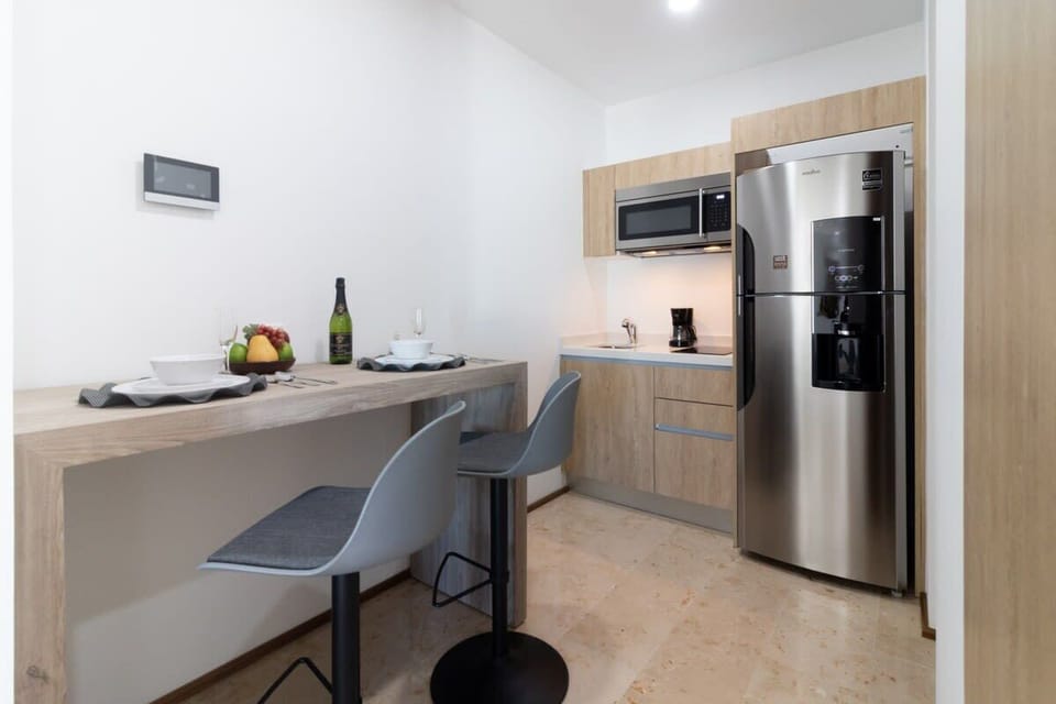 The breakfast bar also serves as a laptop-friendly workspace if needed