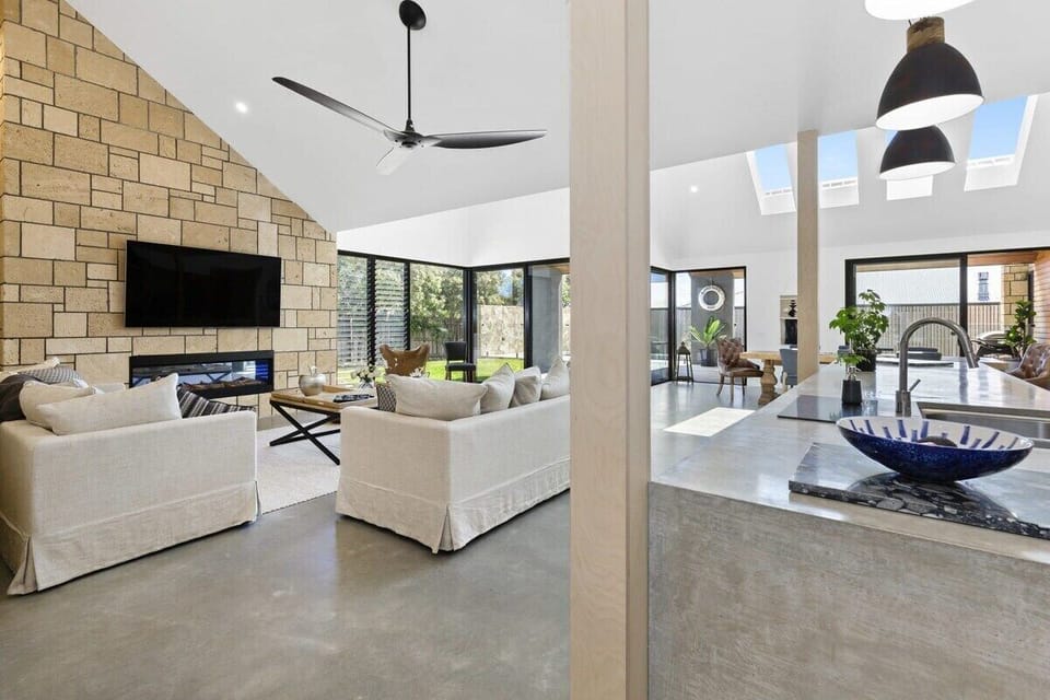 Inside the open-plan living, dining and kitchen areas