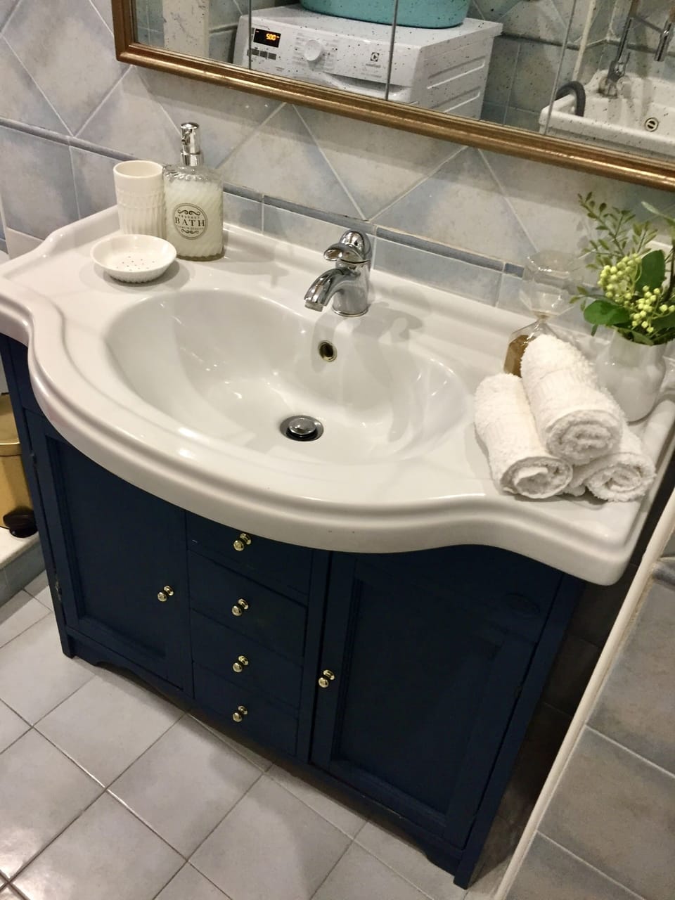 Bathroom with laundry corner