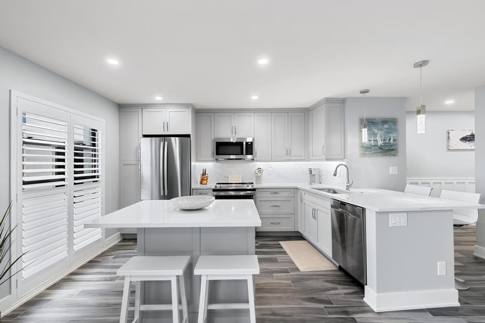 Gorgeous Kitchen with Quartz Countertops and Stainless Steel Appliances