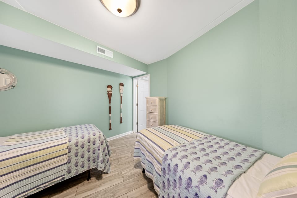 The kiddos will love this bright and fun coastal themed room!