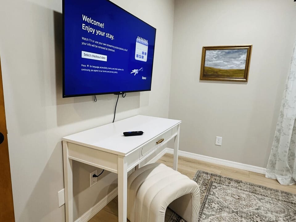 king Bedroom number 3. Showcasing Roku TV