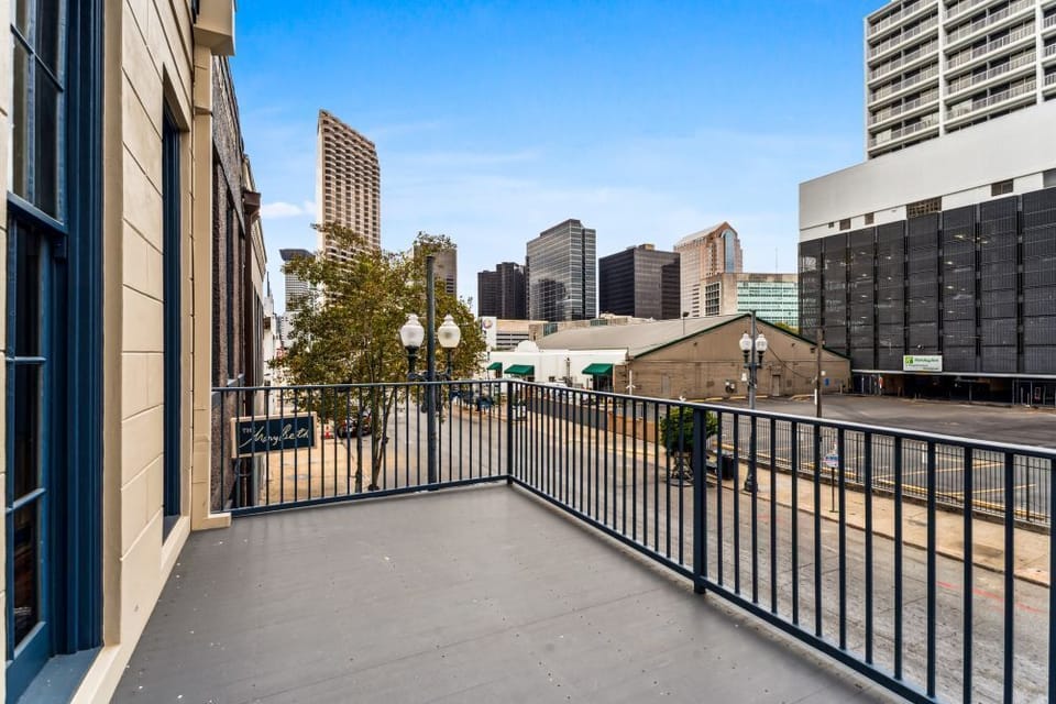 Sip coffee, watch the city stir from your private balcony spot.