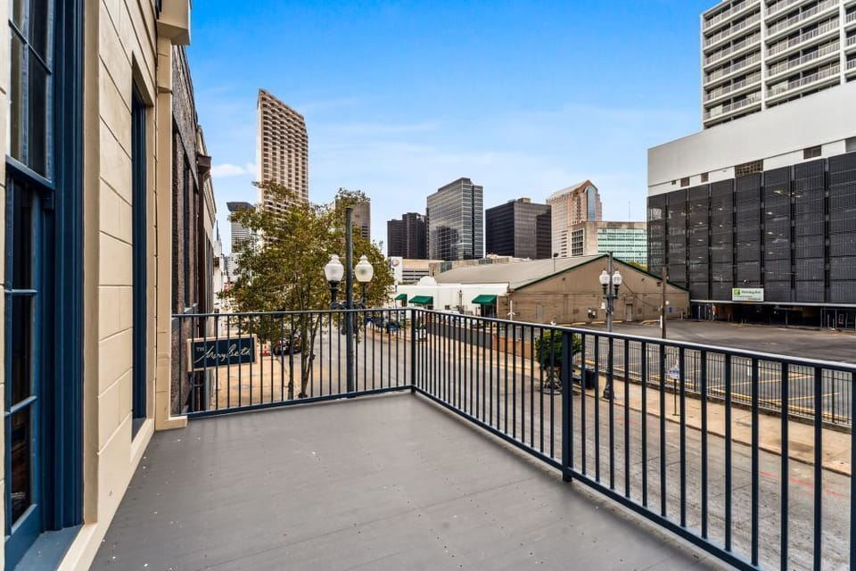 Sip coffee, watch the city stir from your private balcony spot.