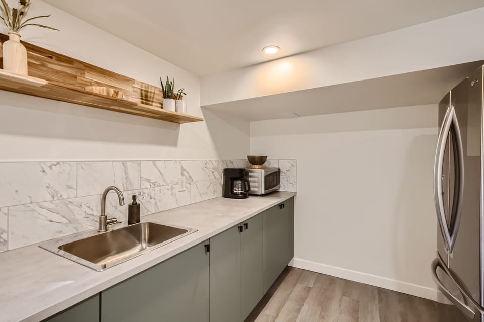 Kitchen, full-size refrigerator, freezer and pantry
