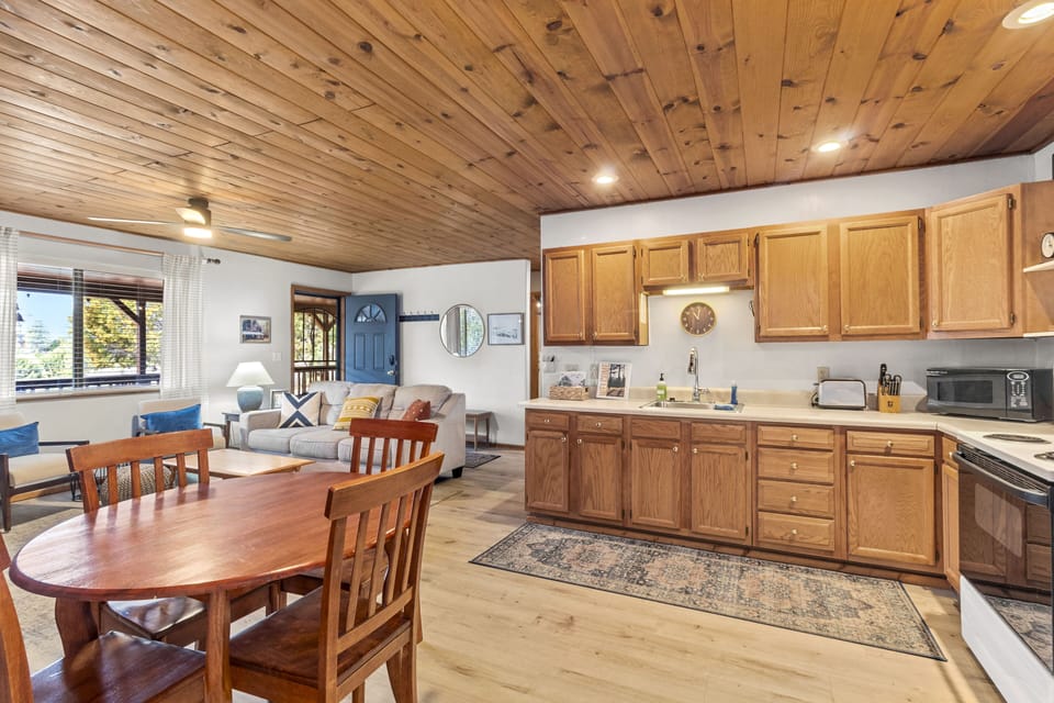 Full view of the kitchen and front room.