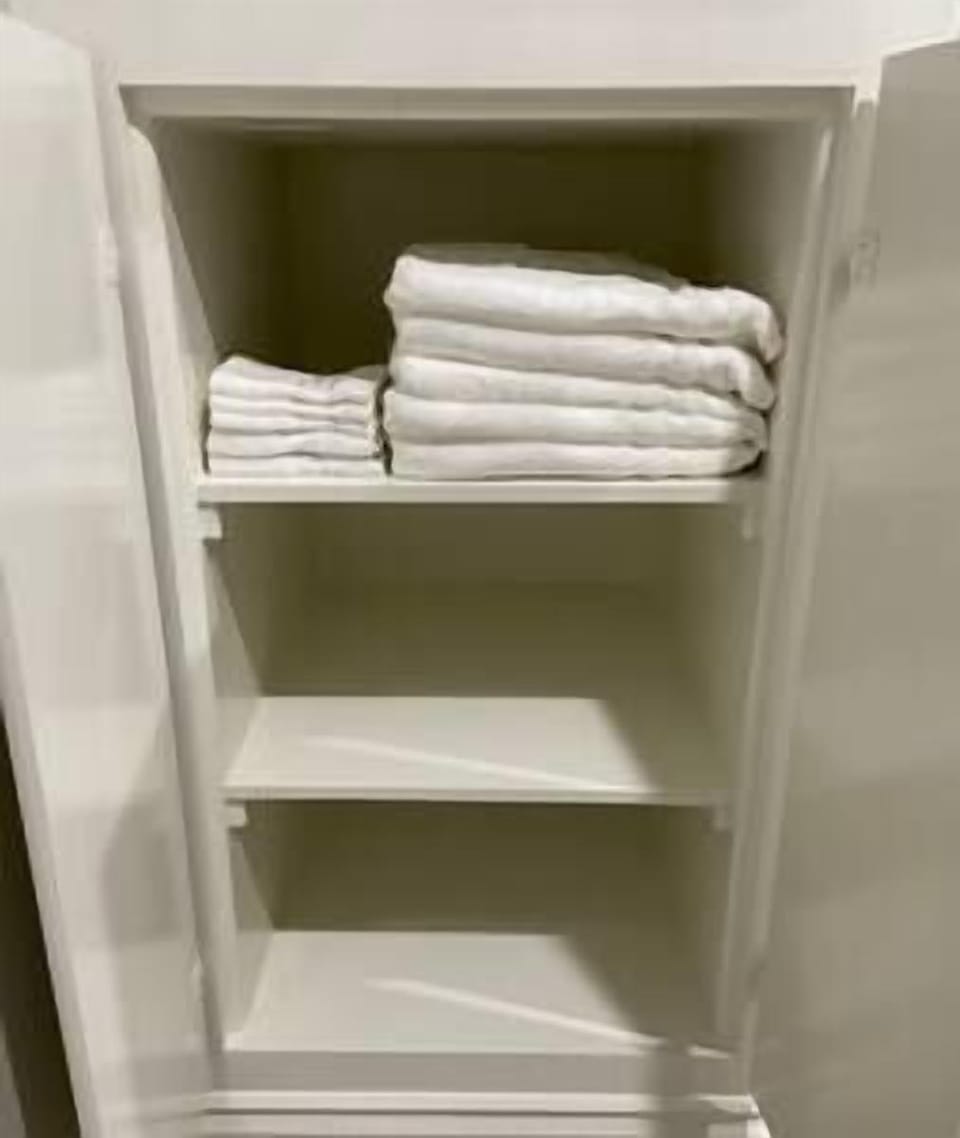 Upstairs Cabinet with towels for your stay. 