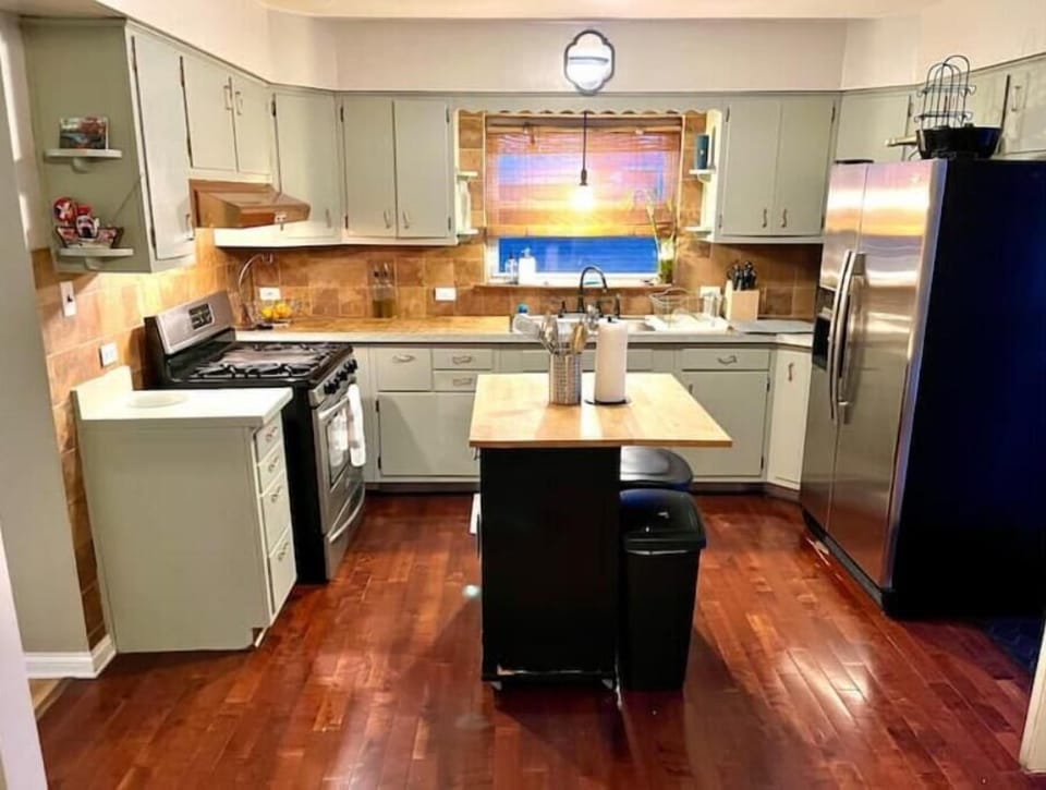 Kitchen with 2 door fridge, fully functional , keurig machine and microwave