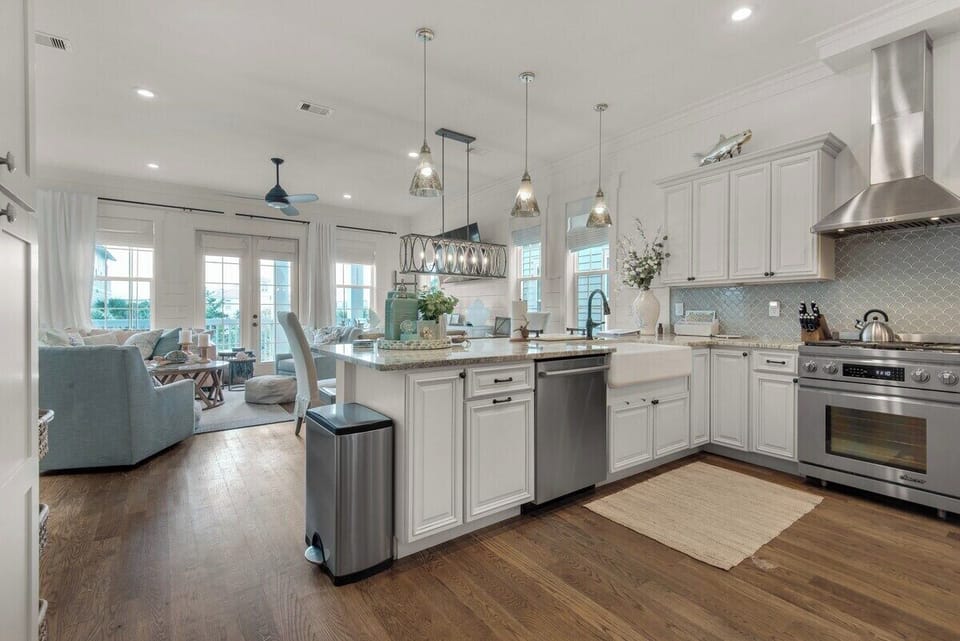 Embrace the joy of entertaining as you effortlessly prepare meals in this expansive kitchen space