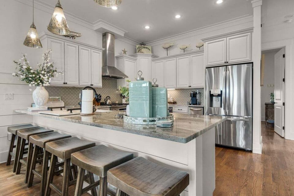 Unwind and entertain with ample bar space and seating for six in this stylish setting