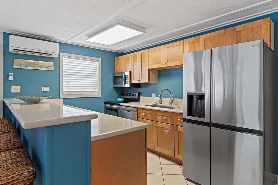 Prep and eat in comfort with AC at your kitchen counter with bar stools.