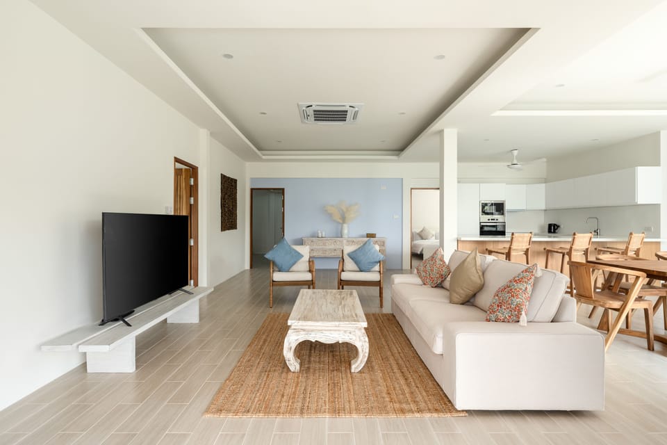 Living area with large flat screen tv.