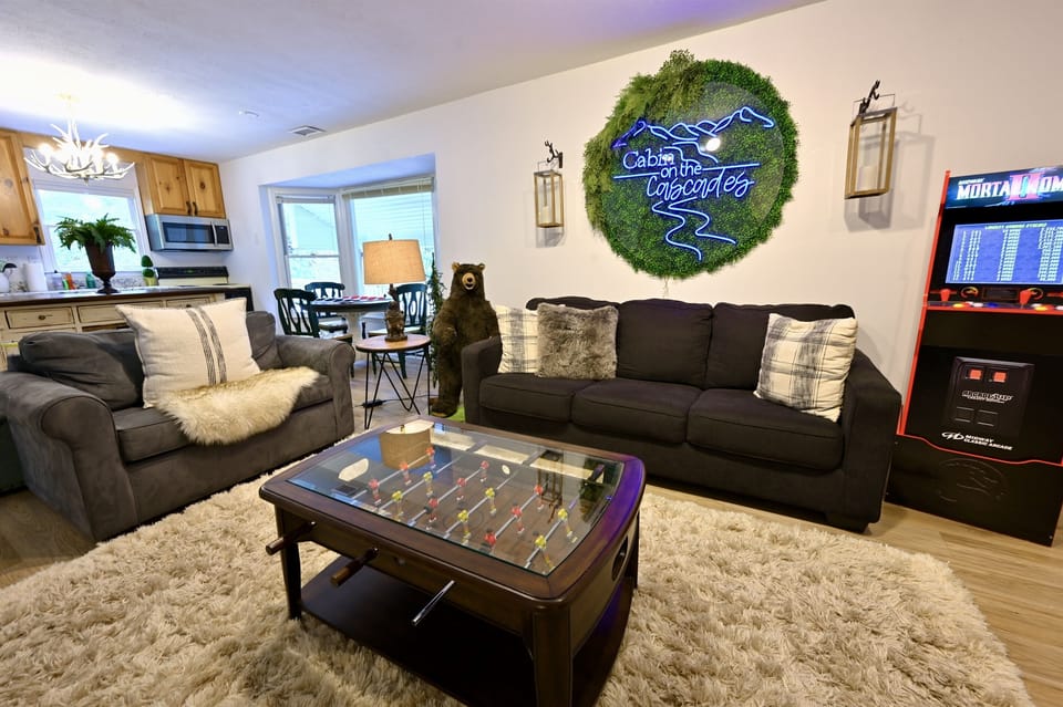 “Kids” side living room with pullout queen sofa (upgraded with a plush memory foam pillow top) and even chair that pulls out into a twin bed!