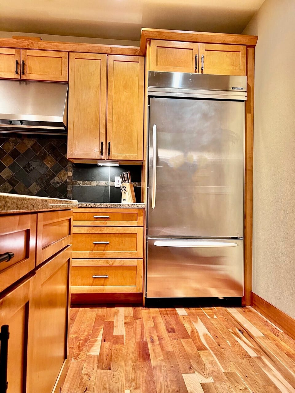 Stainless steel appliances and lots of cabinet space inside the kitchen area. 