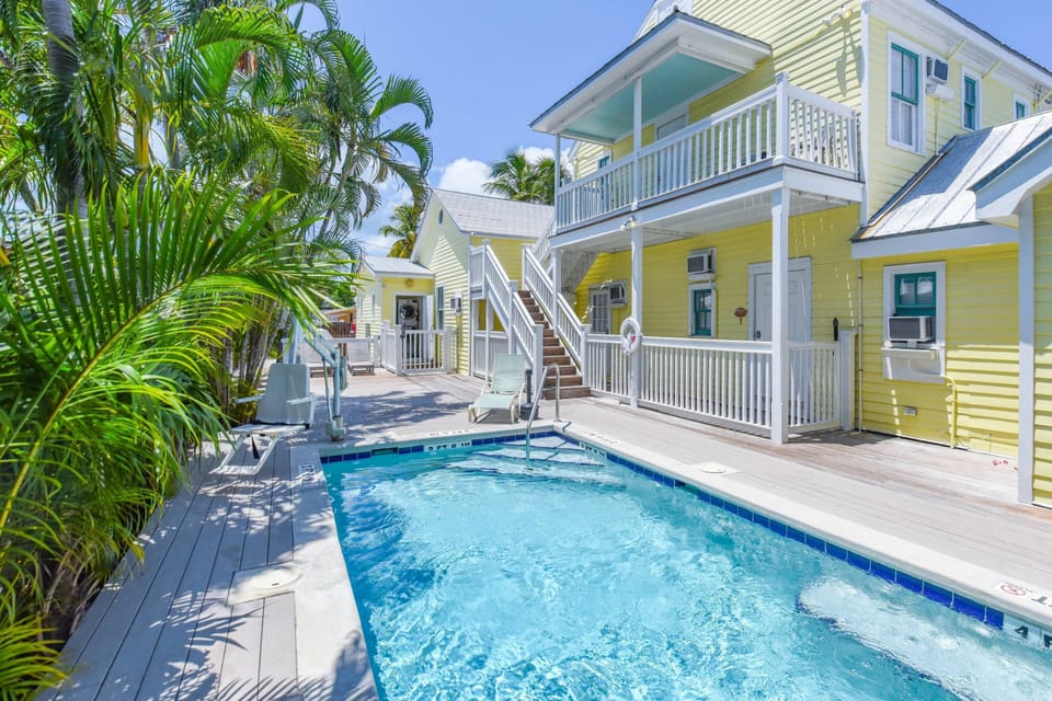 Soak up the sunshine and unwind by the shared pool, basking in relaxation and enjoying the warm rays in a tranquil setting.