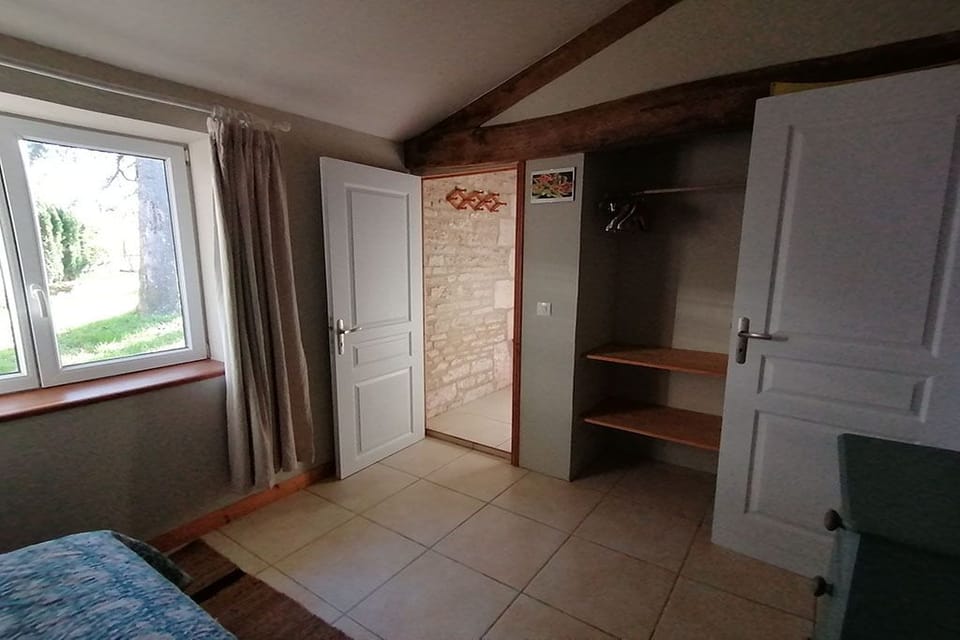 wardrobe and shelving area.