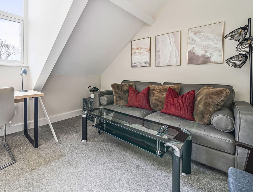 COMFORTABLE COUCH AND WORKING TABLE