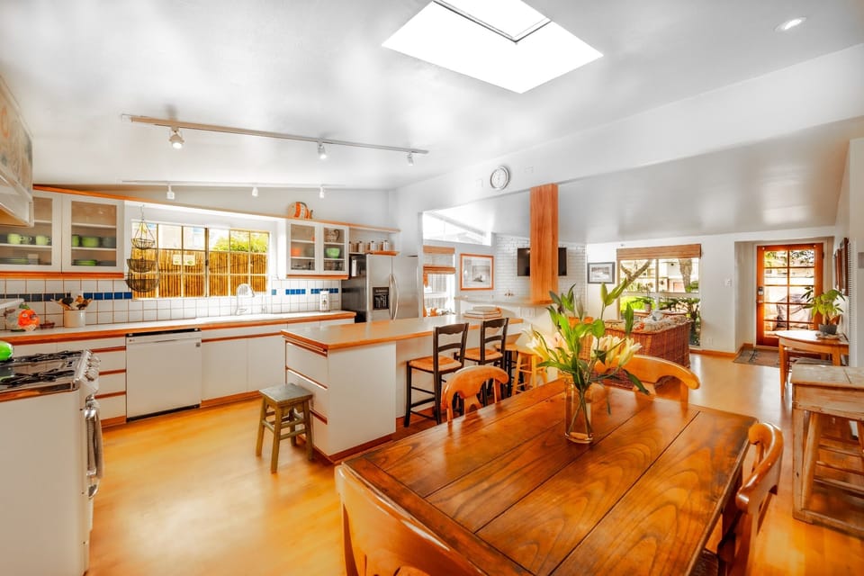 Open-concept dining and kitchen area.