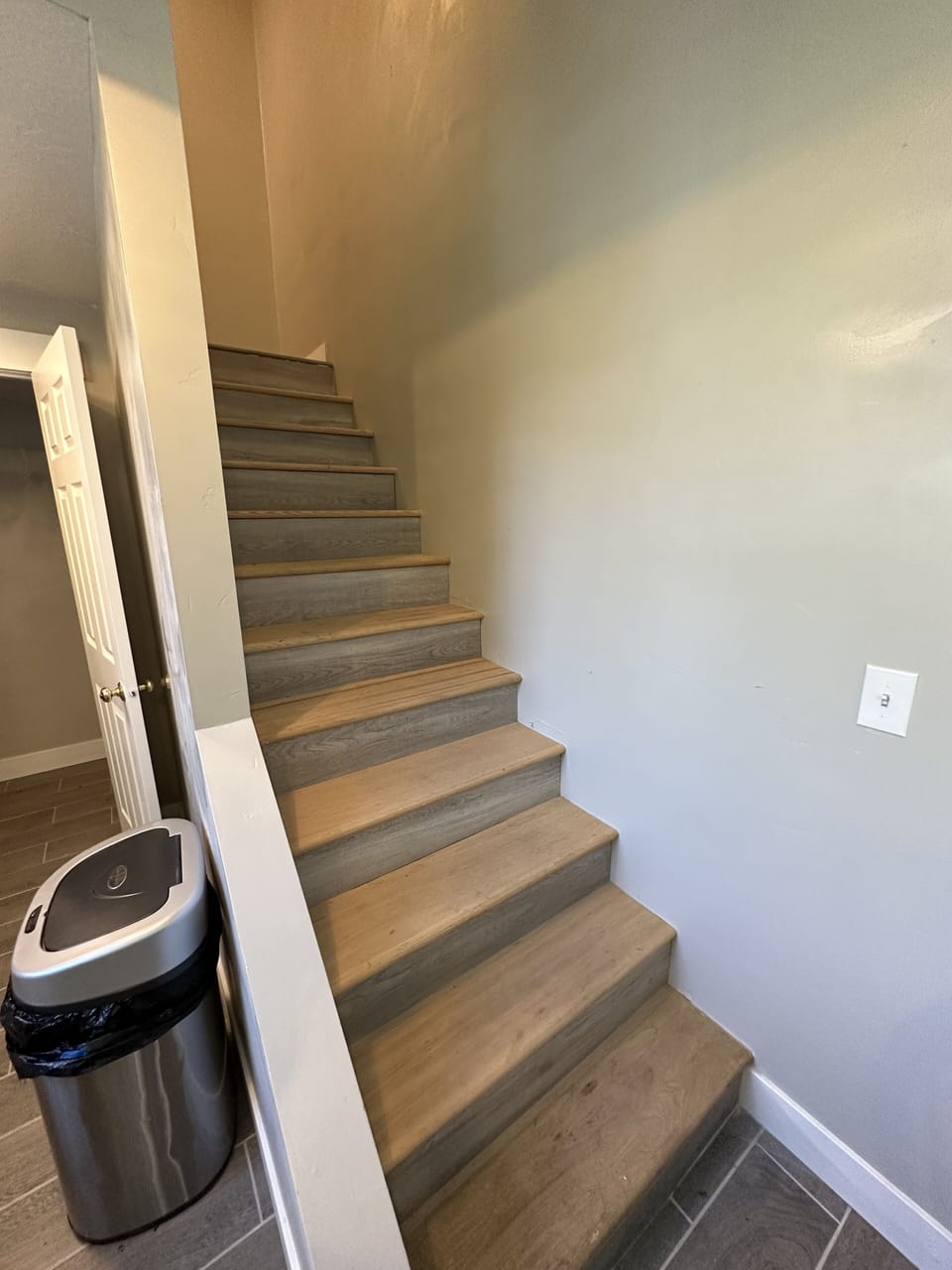 26 stairs from the main floor kitchen are to the living room and bedrooms.