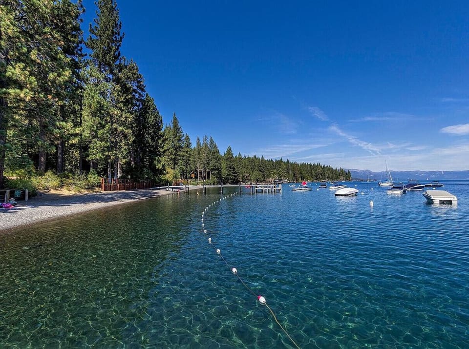 Enjoy access to the Lake Tahoe Park Association Beach with 2 private piers, grassy lawns, picnic / grill areas and more!
