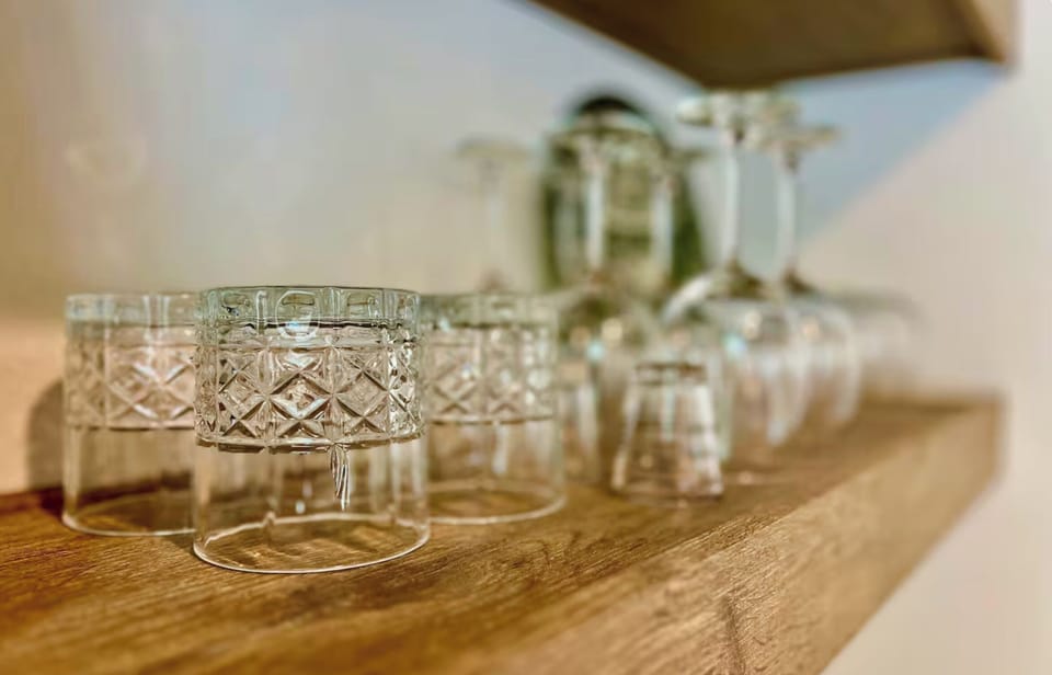 Bar stocked with classic glasses.