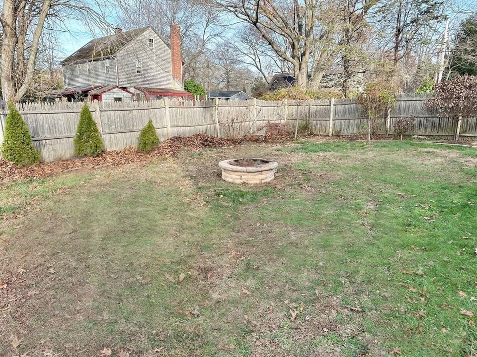 Fenced Yard with Fire Pit and Outdoor Shower