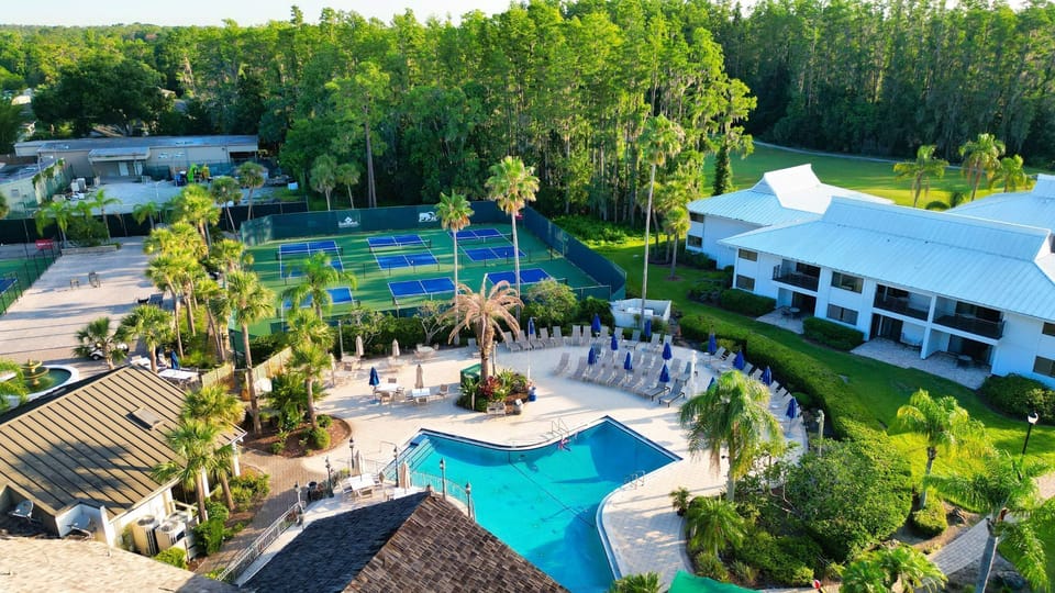 Relax poolside, embraced by the serenity of nature and resort-style luxury.