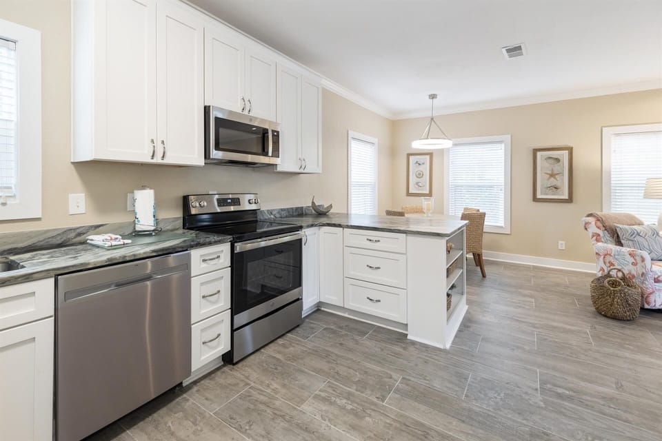 Renovated kitchen. Fully stocked-Dishes, cookware, coffee maker, blender!