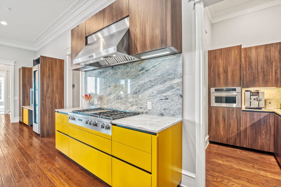 Counters gleam; vista-framed prep becomes performance art.