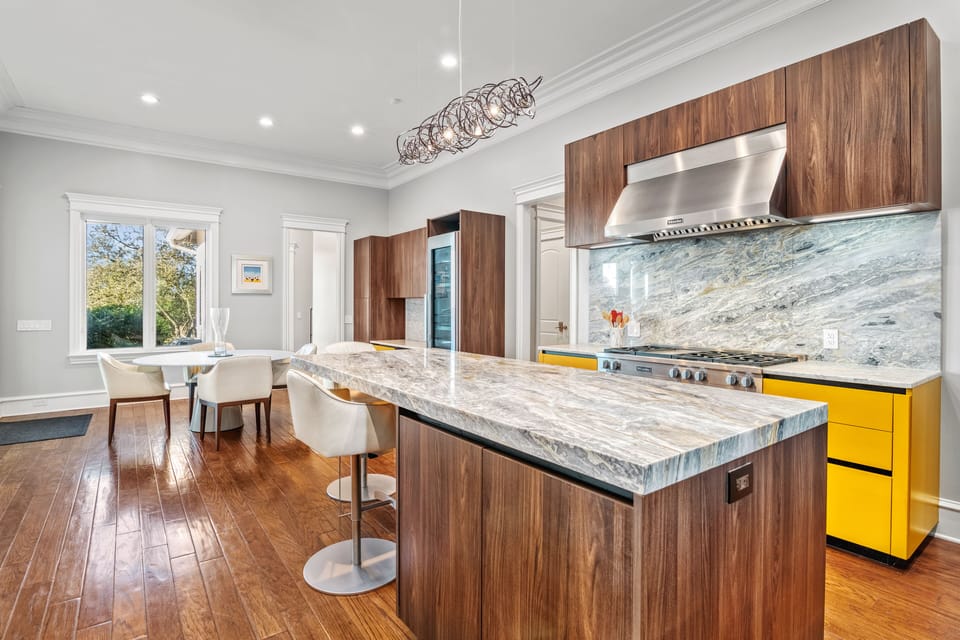 Unleash your inner chef where Miele appliances and hillside views turn every meal into a masterpiece.