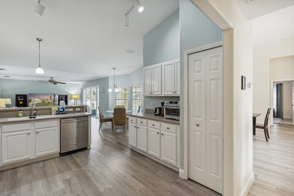 Open-concept kitchen looking to the main living room