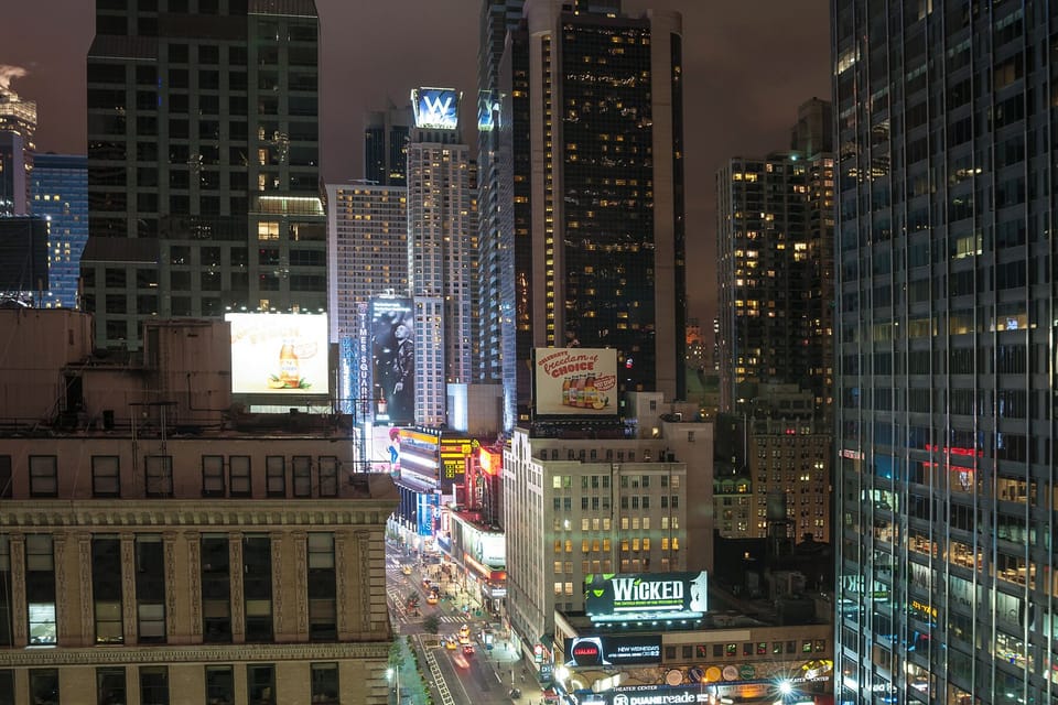 Gaze out at dazzling city lights from your private window.
