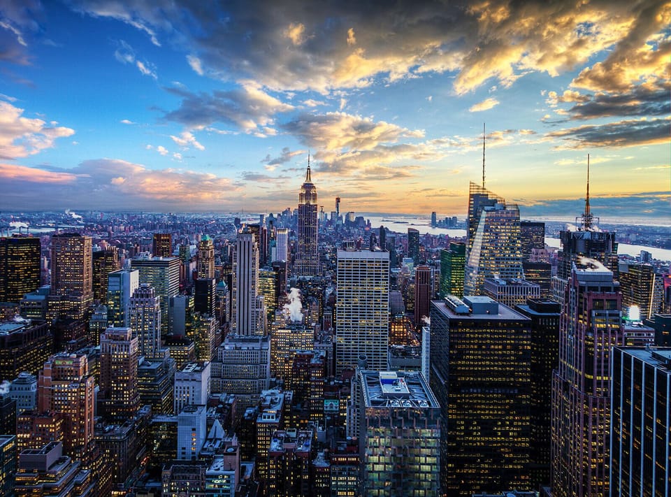Dream over skyline sunsets and the city lights below.