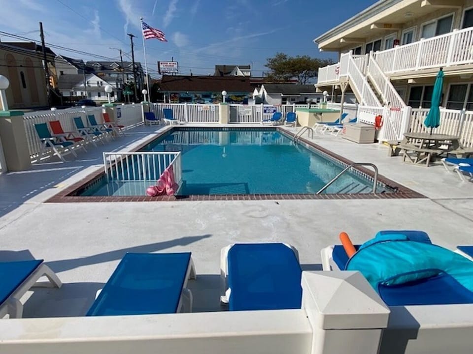 2 Pools, 1 Heated with a child area.  Lounge chairs and Dining Tables
