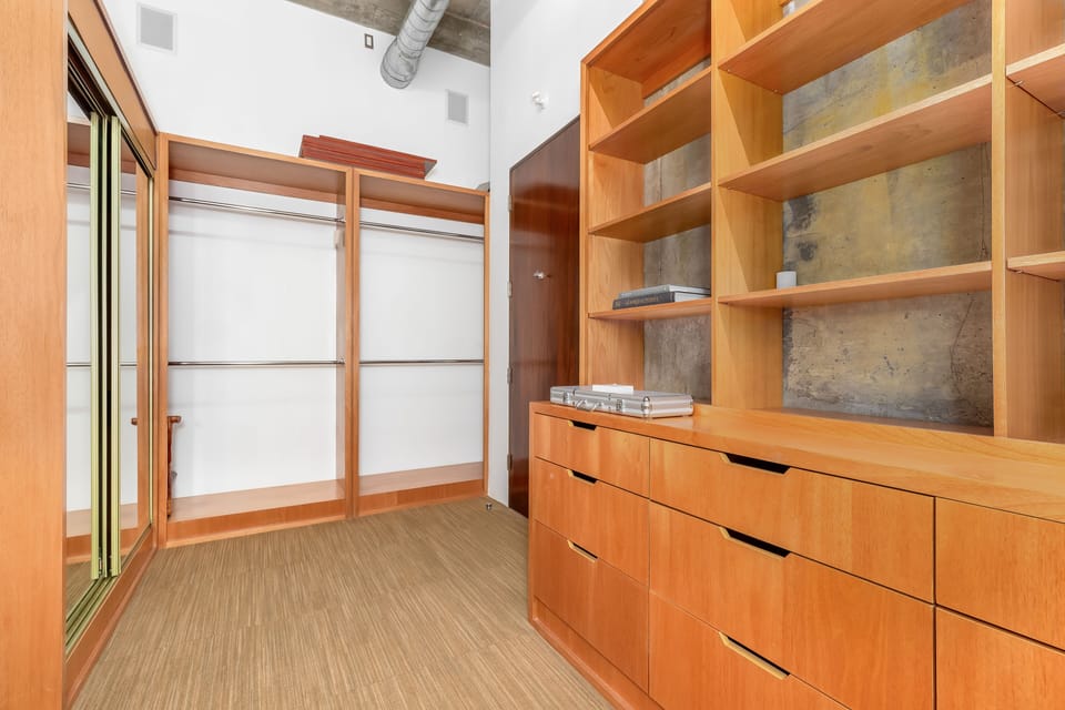 Master Walk-in Closet with Drawers and Shelves