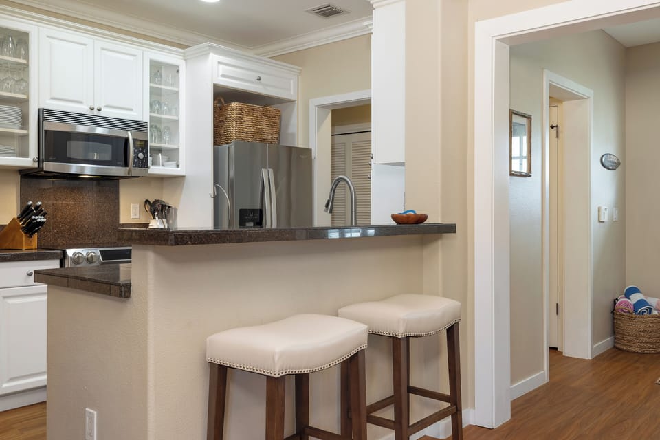 Open kitchen and bar area perfect for casual breakfasts before a day of sun and adventure.