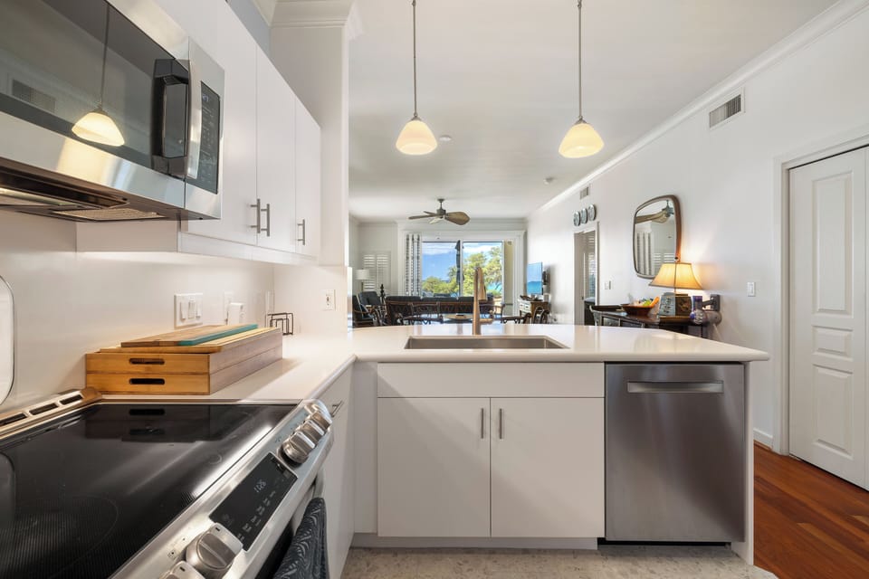 The open dining space keeps you in the conversation while the meal comes together.