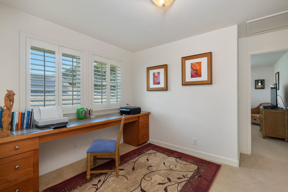 Loft area at top of the stairs, the perfect spot for family time, game nights, or remote work.