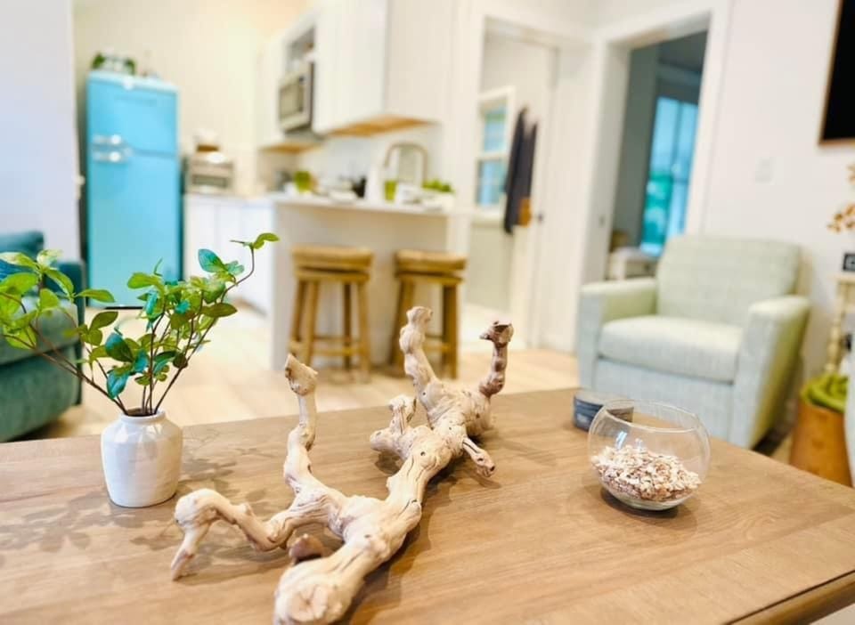 Living Room: coffee table pulls up for dining or playing games