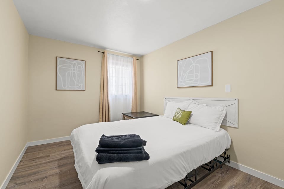 QUEEN bed in guest bedroom.