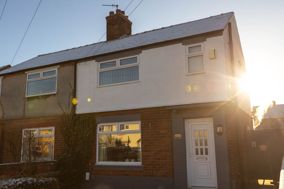 Property with driveway for parking and free parking on the street. 