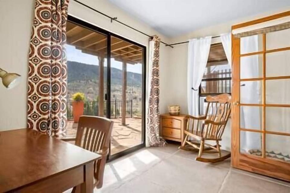 Small office leading to the back sandstone deck