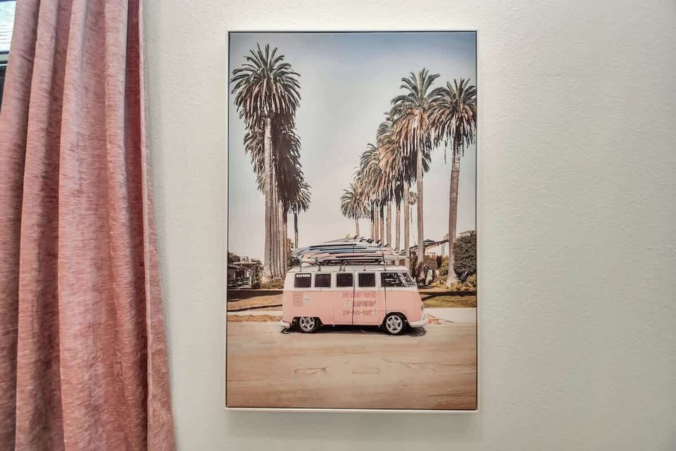 Cute artwork adds a touch of comfort to the room. 