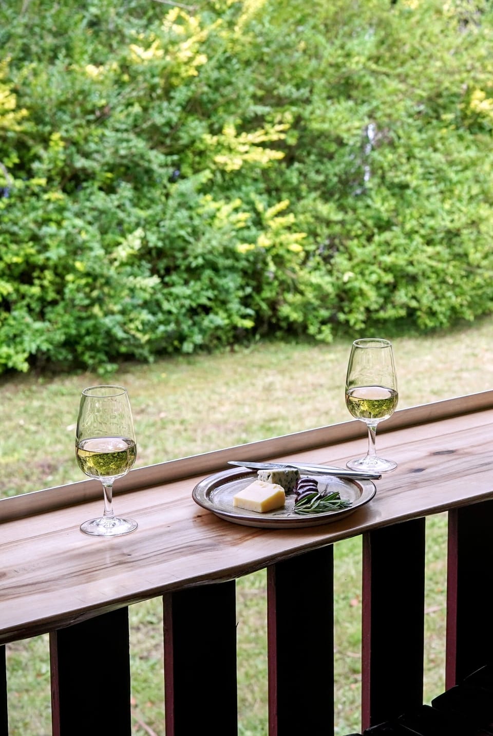 Wine on the veranda, overlooking the front lawn