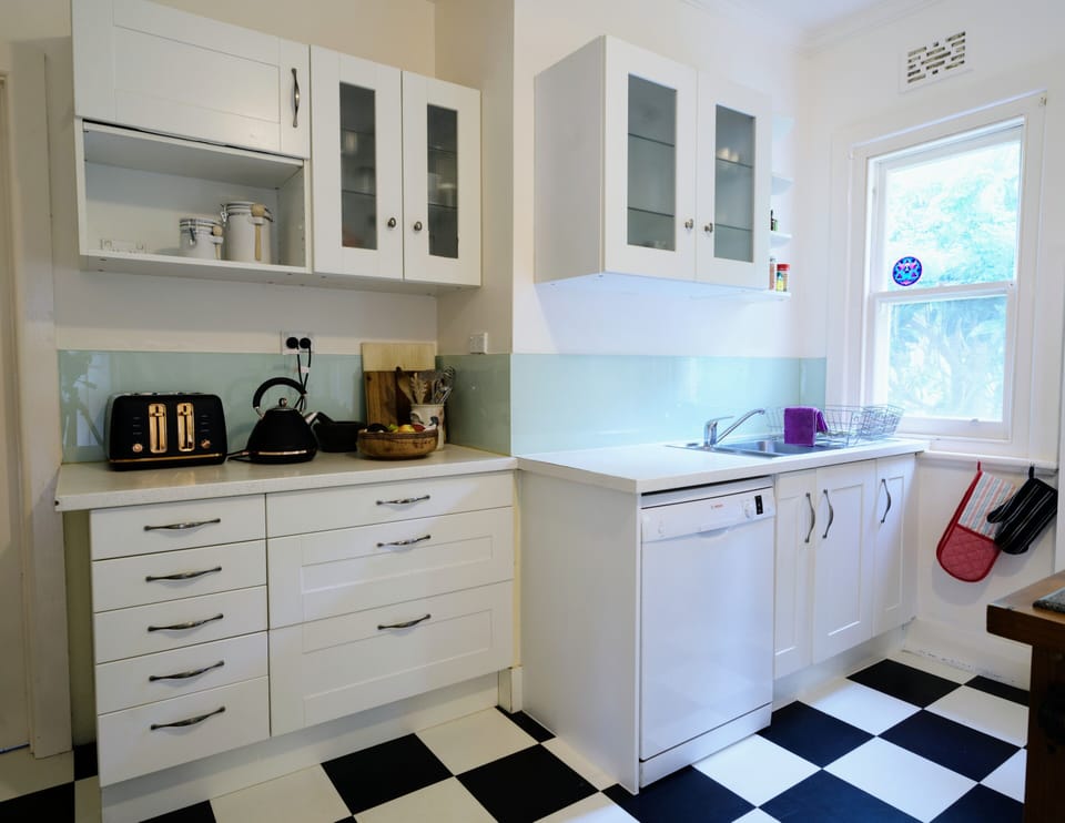 Kitchen with Bosch dishwasher and Beko gas stove