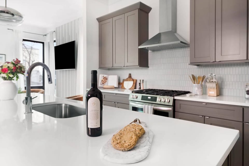 Fully Stocked Kitchen with Modern Appliances and Ample Storage
