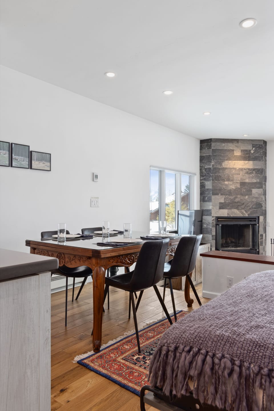 Dining Area looking in Living room with Murphy Bed lowered