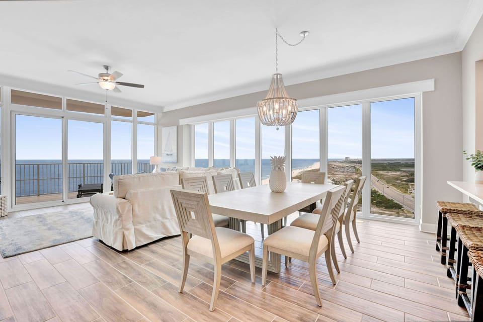 Enjoy chandelier-lit dining or family game night while the shore stretches to the horizon