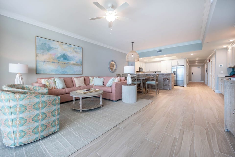 Imagine curling up in the patterned armchair by the coffee table and feeling the relaxing coastal vibe