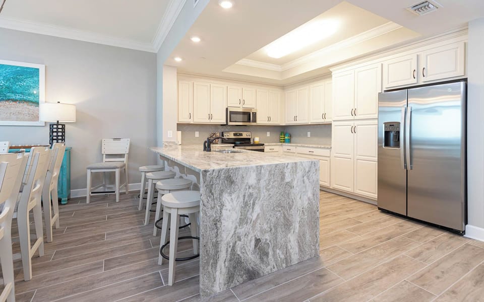 Settle on a bar stool at the veined stone counter to sip coffee as you begin your day